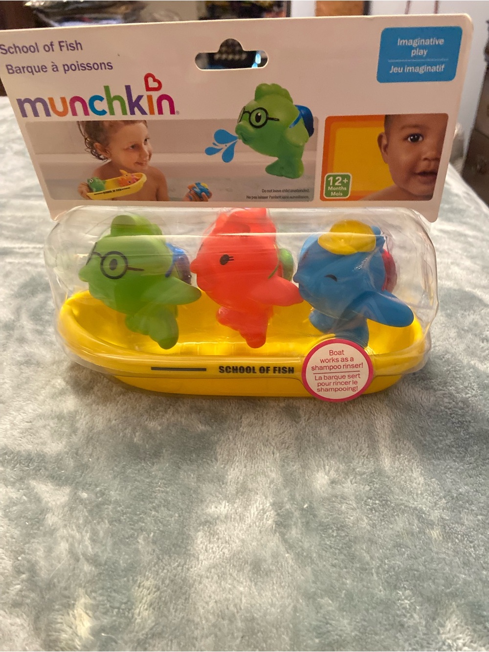 Munchkin Yellow Boat with Green, Red and Blue Fish Bath Toy